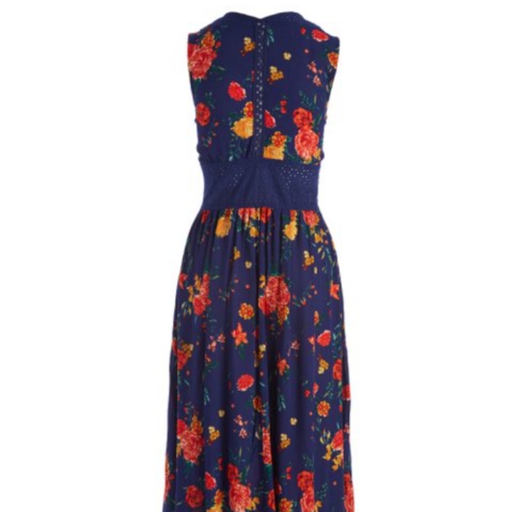 Floral duster sleeveless jacket buttons at waistline